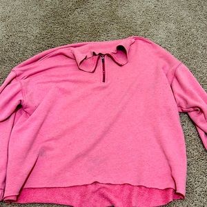 Gently worn pink half zip sweatshirt